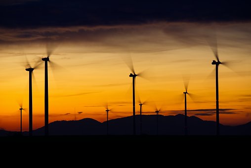 Picture of windmills at sunset.